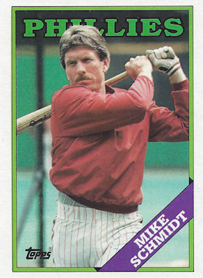 A picture of a 1988 Topps baseball card featuring Mike Schmidt following through after a practice swing.
