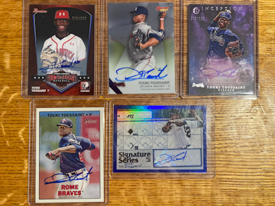 A selection of five Touki Toussaint autographed cards.